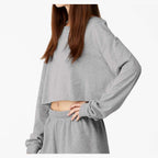 BELLA + CANVAS Women's FWD Fashion Crop Long Sleeve Tee - Athletic Heather - On Model Side