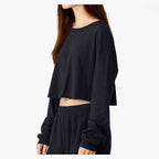 BELLA + CANVAS Women's FWD Fashion Crop Long Sleeve Tee - Black - On Model Side