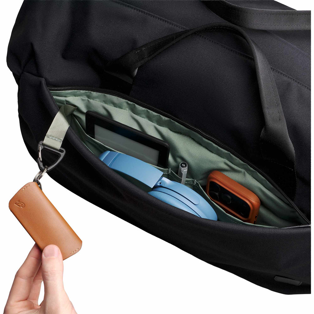 Bellroy Classic Duffel Bag with AirTag Pocket, 45L Embroidery - Black - Left Angle Detail