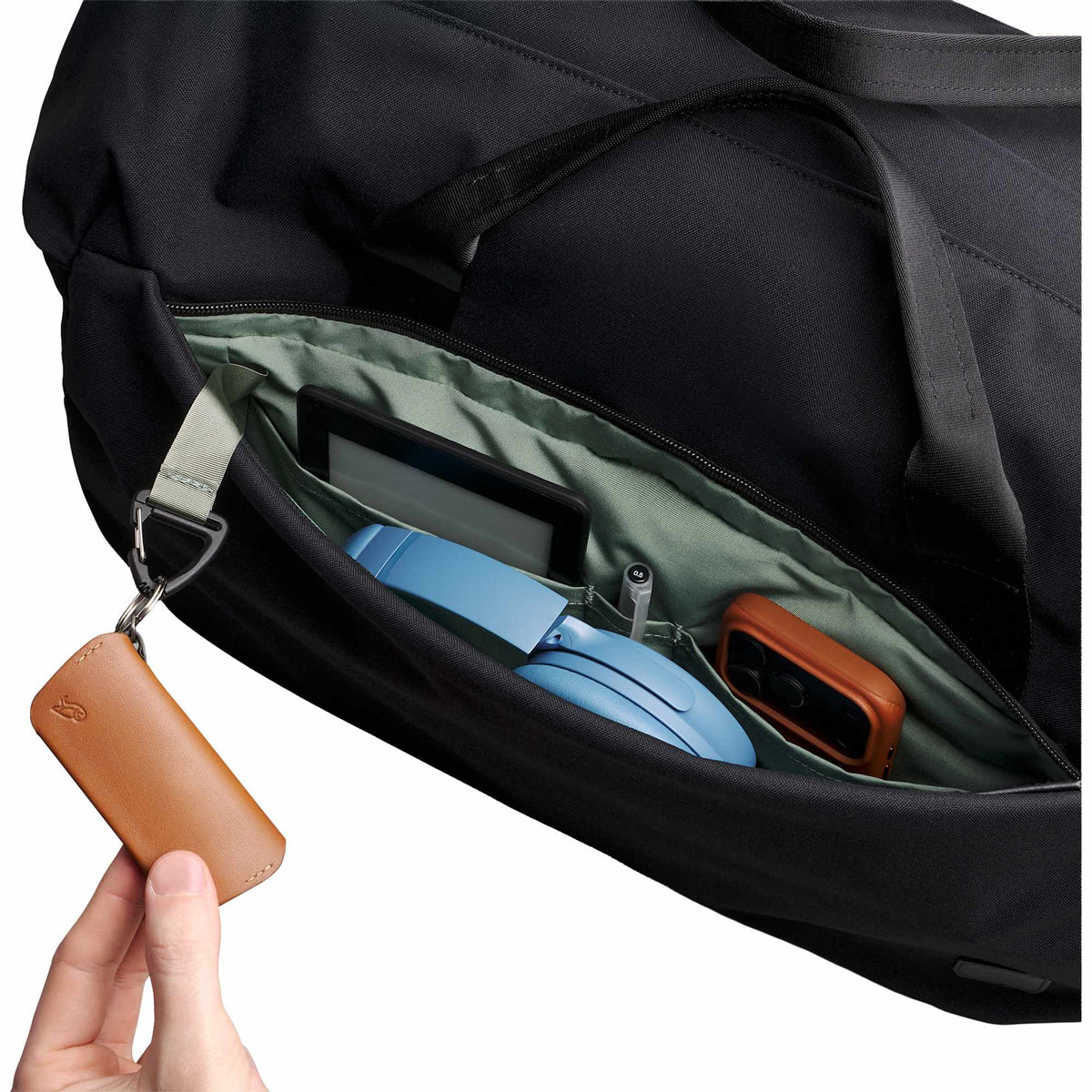 Bellroy Classic Duffel Bag with AirTag Pocket, 45L Transfer - Black - Left Angle Detail