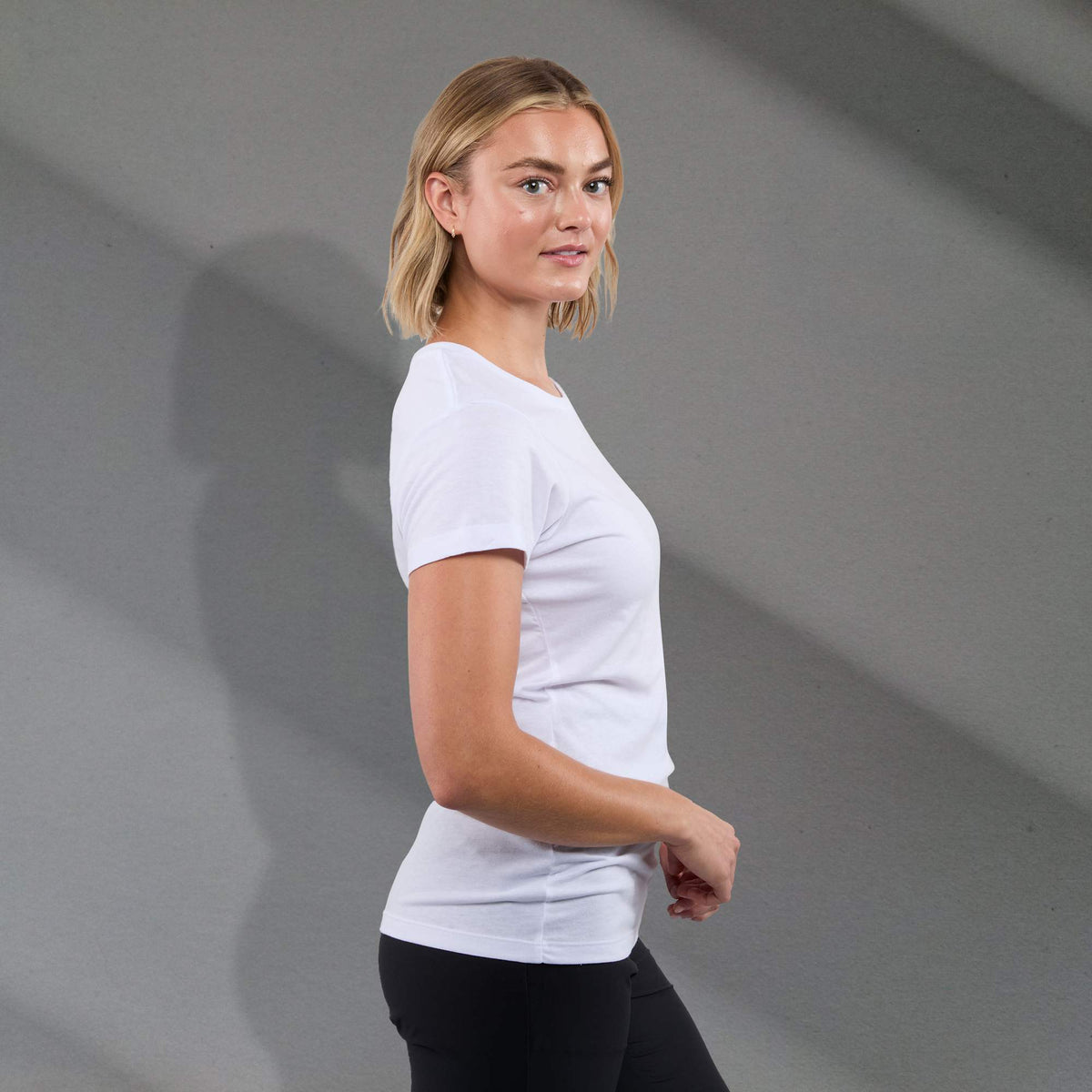 Bodie Crew Neck Tee with Chainstitch Collar for Women Transfer - White - Right Side On Model