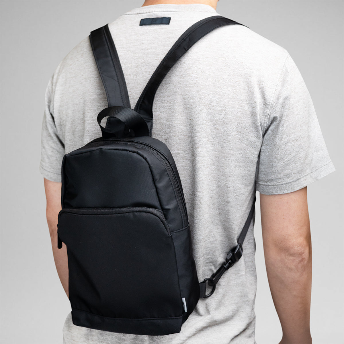 Caleb Convertible Backpack and Sling Bag in Recycled PET - Black - Backpack_Inuse