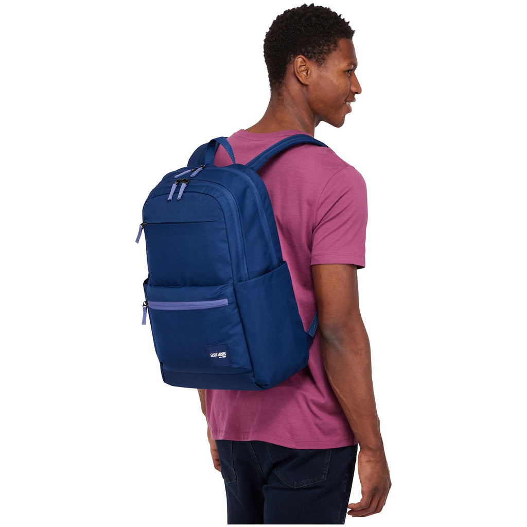 Case Logic Uplink Recycled Laptop Backpack, 26L Transfer - Navy Blue - Left Angle Lifestyle
