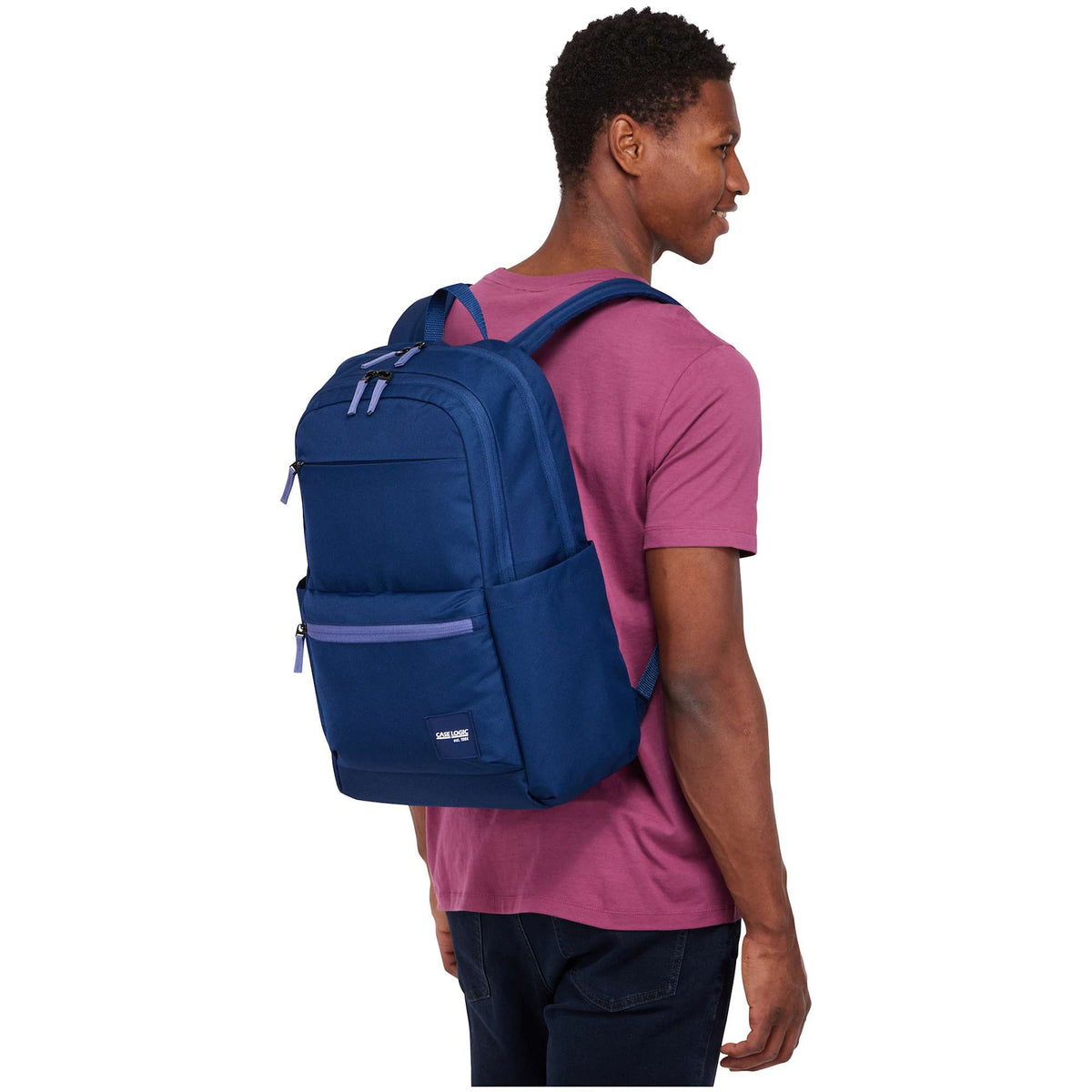 Case Logic Uplink Recycled Laptop Backpack, 26L Transfer - Navy Blue - Left Angle Lifestyle