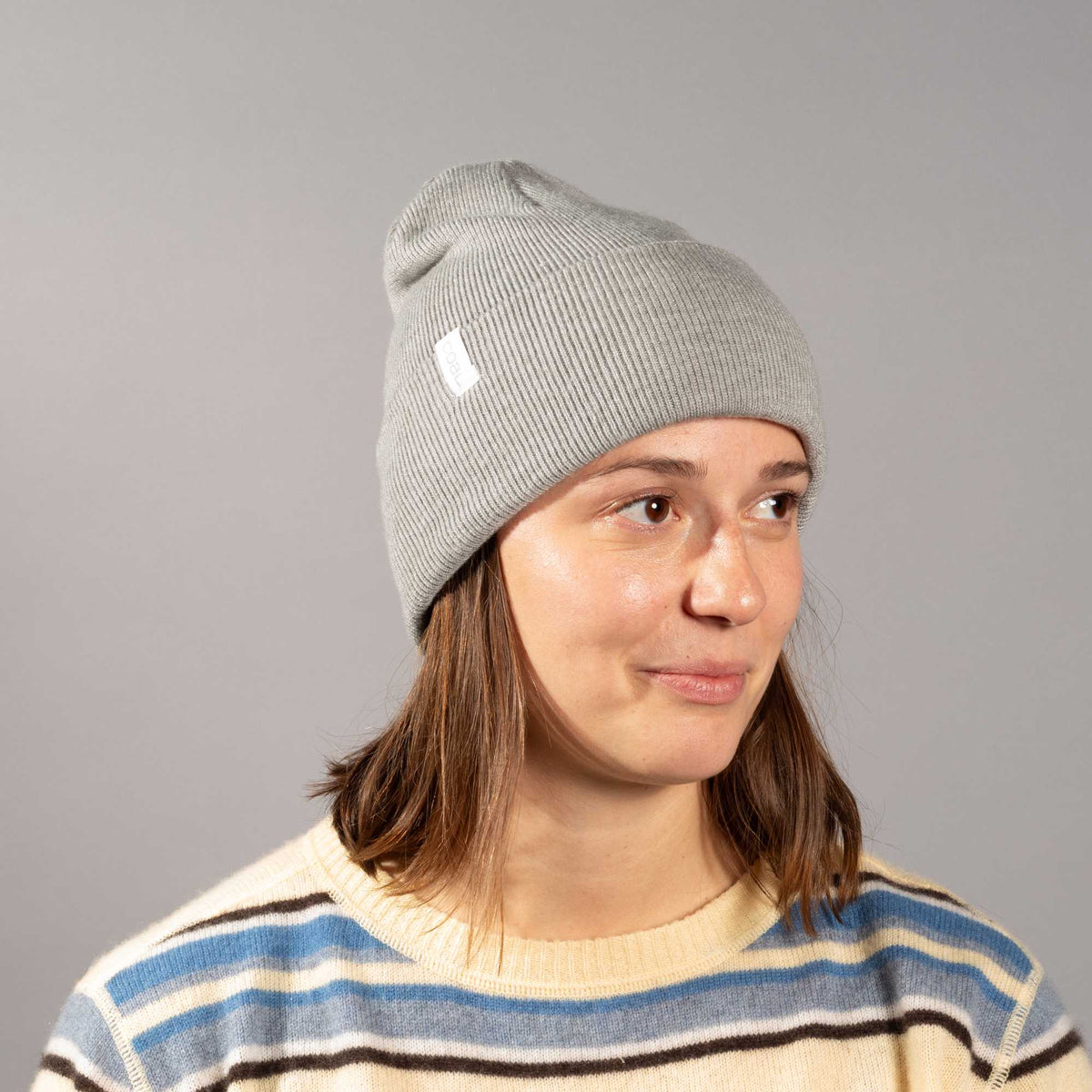 Coal Uniform Cuff Beanie in Recycled Knit Embroidery - Heather Grey - Front On Model
