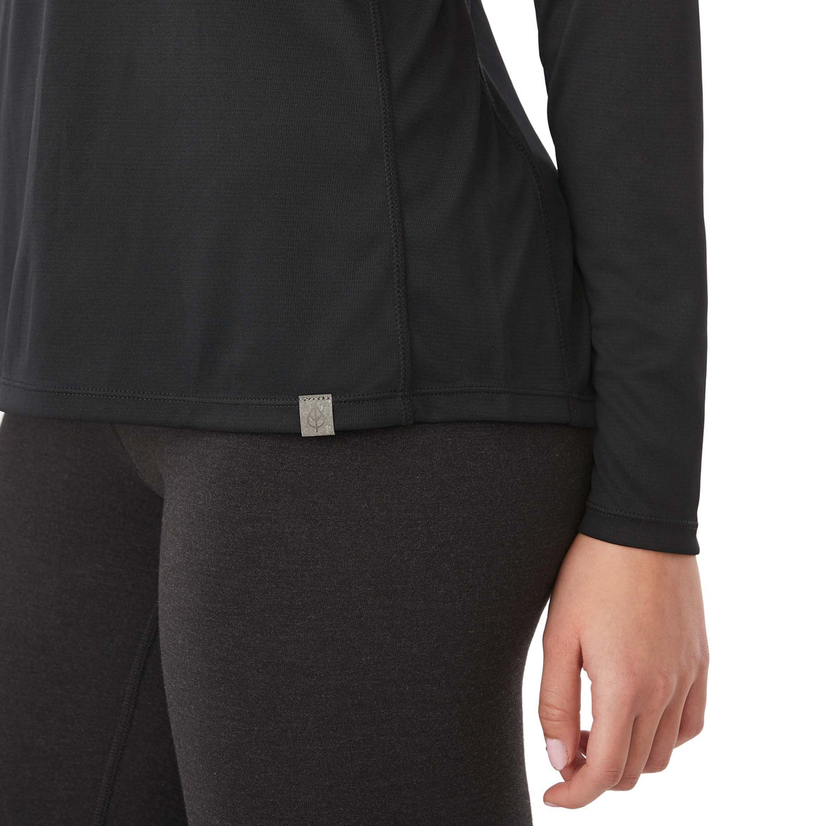 Evans Recycled Performance Half Zip for Women Debossing - Black - Detail On Model 2