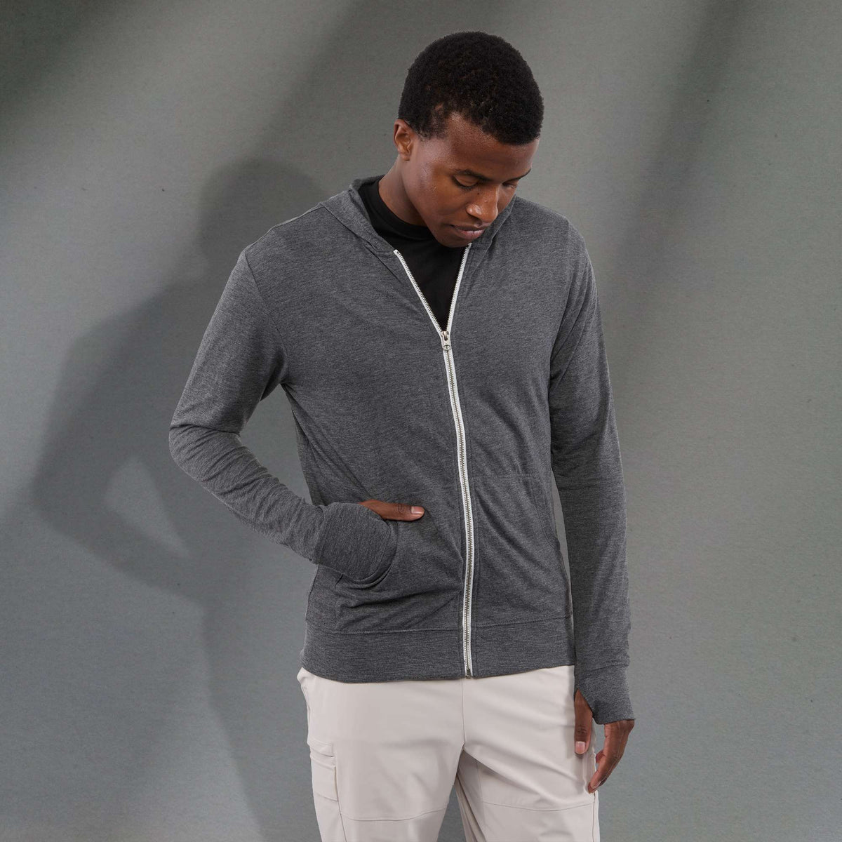 Garner Lightweight Knit Zip Hoodie with Thumb Holes for Men Transfer - Heather Dark Charcoal - Front On Model 3