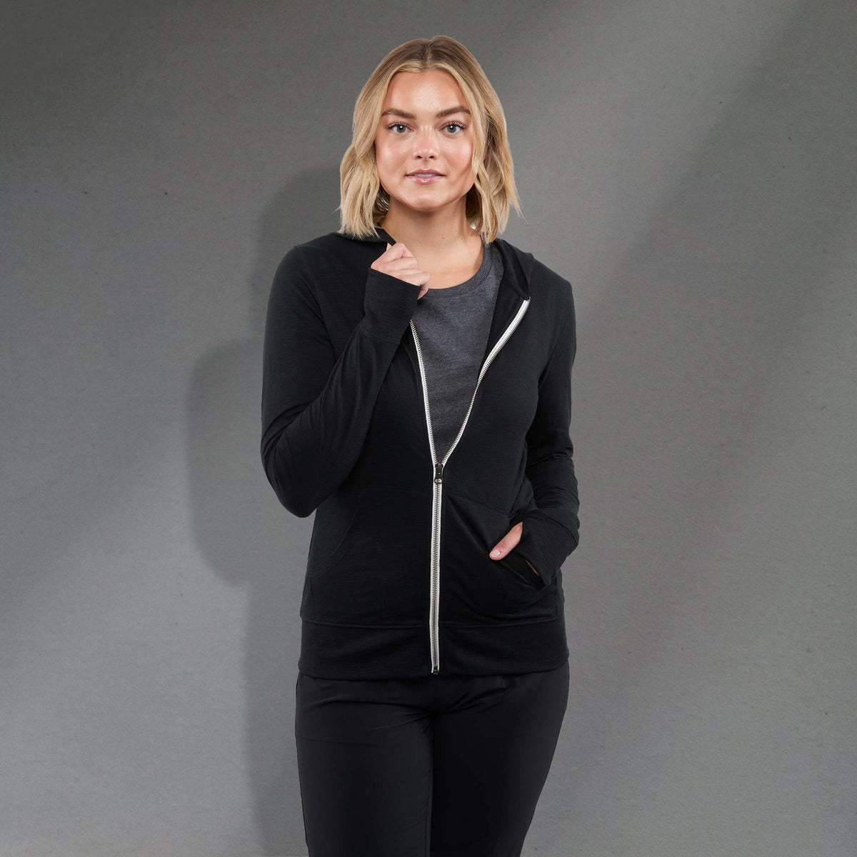 Garner Lightweight Knit Zip Hoodie with Thumb Holes for Women Transfer - Black - Front On Model