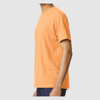 Gildan Unisex Softstyle® CVC T-Shirt - Tangerine Mist - On Model Side