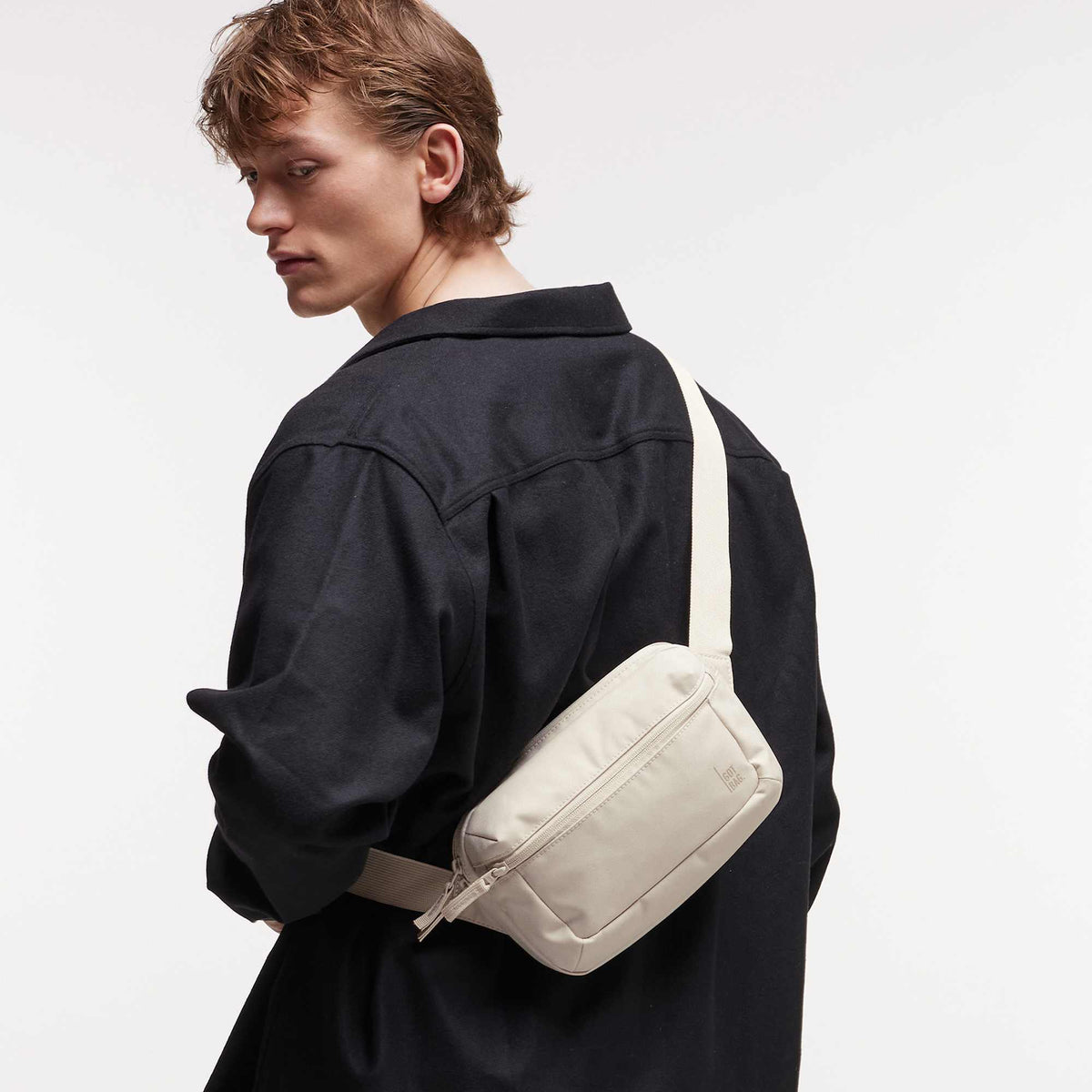 GOT BAG Sling Bag in Recycled Ocean Plastic, 2.4 L Embroidery - Soft Shell - Front On Model 2