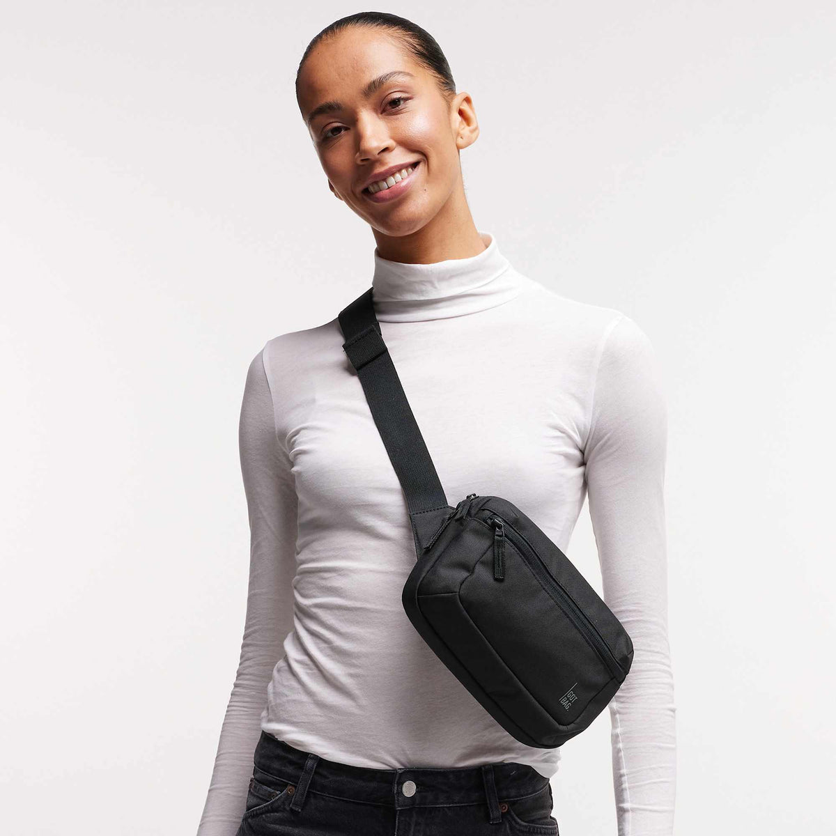 GOT BAG Sling Bag in Recycled Ocean Plastic, 2.4 L Transfer - Black - Front On Model 2
