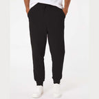 Independent Trading Co. Men's Midweight Fleece Sweatpants - Black - On Model Front