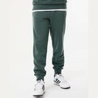 Independent Trading Co. Unisex Pigment-Dyed Fleece Sweatpants - Pigment Alpine Green - On Model Front