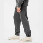 Independent Trading Co. Unisex Pigment-Dyed Fleece Sweatpants - Pigment Black - On Model Side