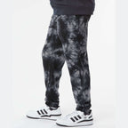 Independent Trading Co. Unisex Tie-Dyed Fleece Sweatpants - Tie Dye Black - On Model Side