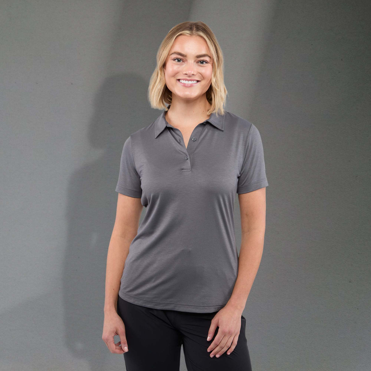 Izu Everything Eco Stretch Polo for Women Transfer - Charcoal - Front On Model 2