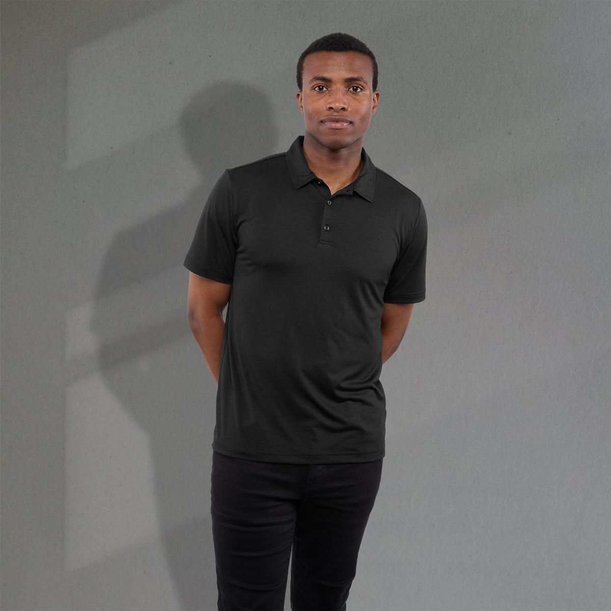 Izu Everything Performance Eco Polo for Men Transfer - Black - Front On Model
