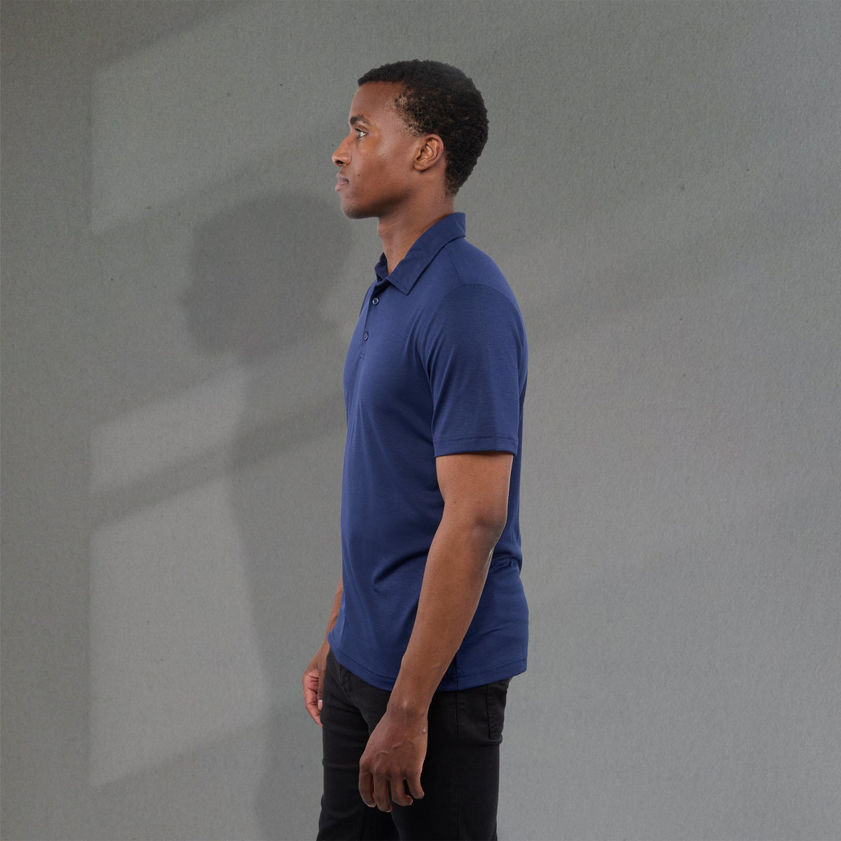 Izu Everything Performance Eco Polo for Men Transfer - Vintage Navy - Left Side On Model