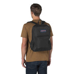 JanSport Cross Town Plus Laptop Backpack, 15 Inch Embroidery - Black - Front Onmodel