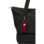 Lip Balm Holder Bottle Charm in Neoprene - Maroon - Propped On Model Bag
