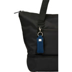 Lip Balm Holder Bottle Charm in Neoprene - Navy - Propped On Model Bag