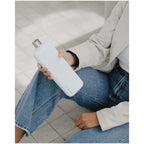 memobottle Slim Flat Stainless Steel Bottle, 20 oz Full Color - White - Front Lifestyle 2