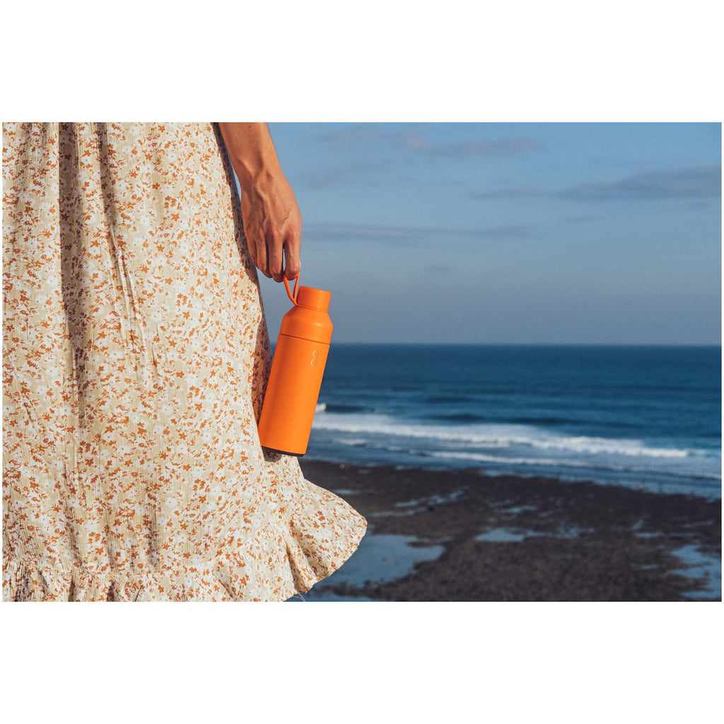 Ocean Bottle Original Insulated Bottle, 17 oz - Orange - Front Lifestyle 2
