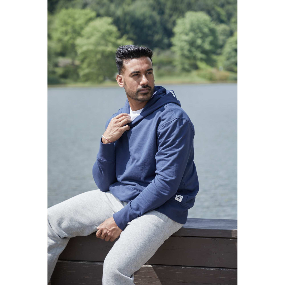 Roots73 Canmore Eco Pullover Hoodie, Unisex Transfer - Indigo Blue - Left Angle On Model