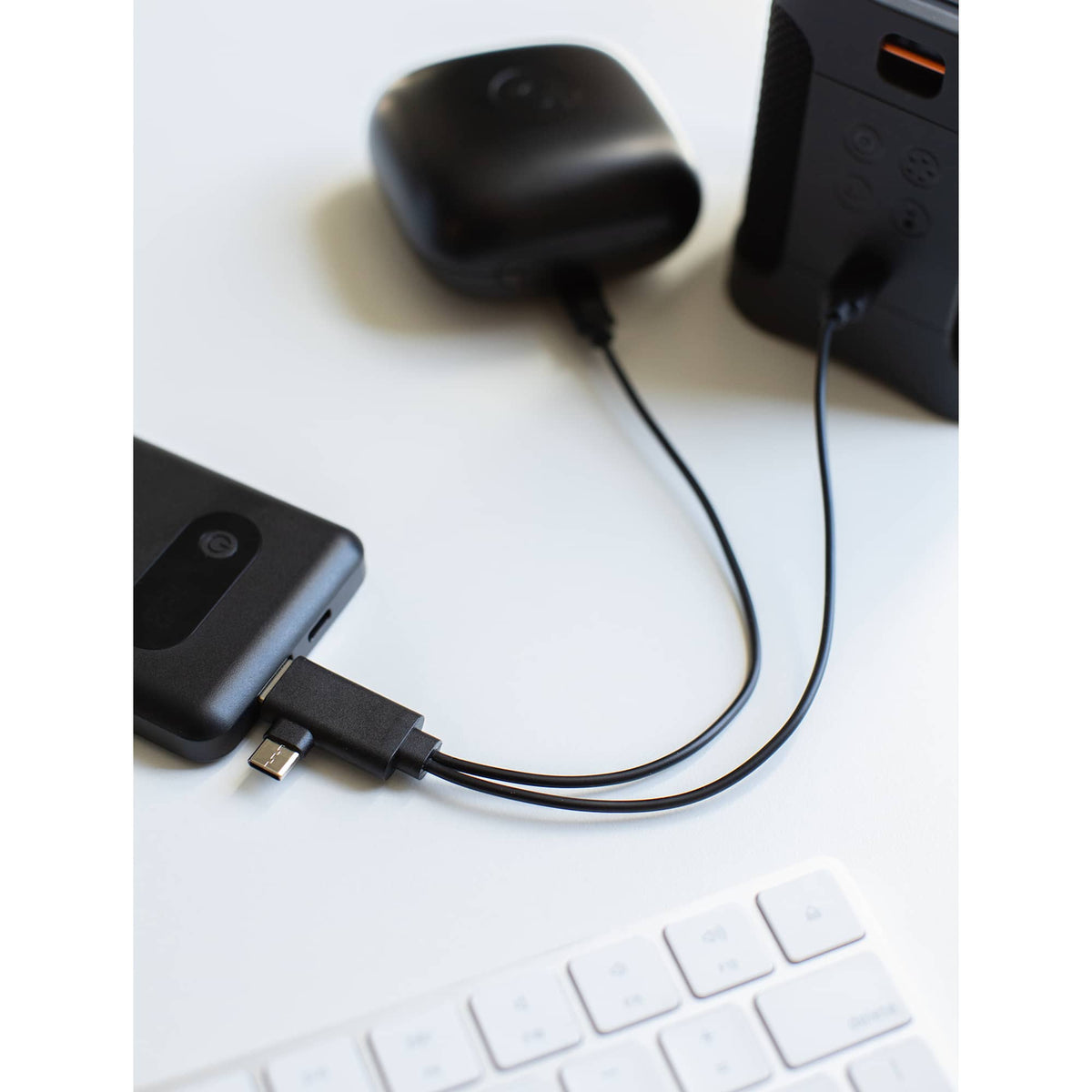 Short Recycled 5-in-1 Charging Cable, 9.8 Inch - Black - Propped