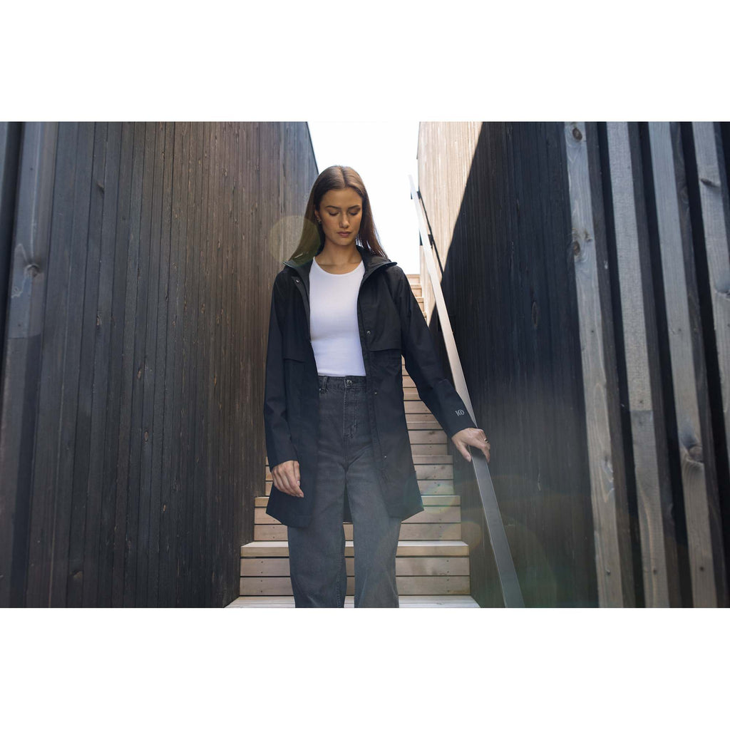 tentree Nimbus Long Waterproof Rain Jacket for Women Embroidery - ten Meteorite Black - Front On Model