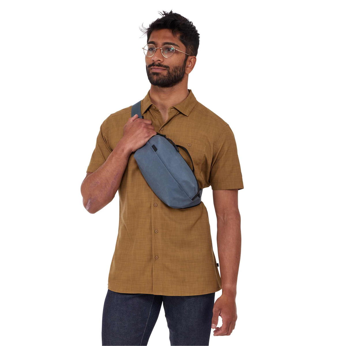Thule Aion Sling Bag in Recycled Fabric Transfer - Dark Slate - Front On Model 2