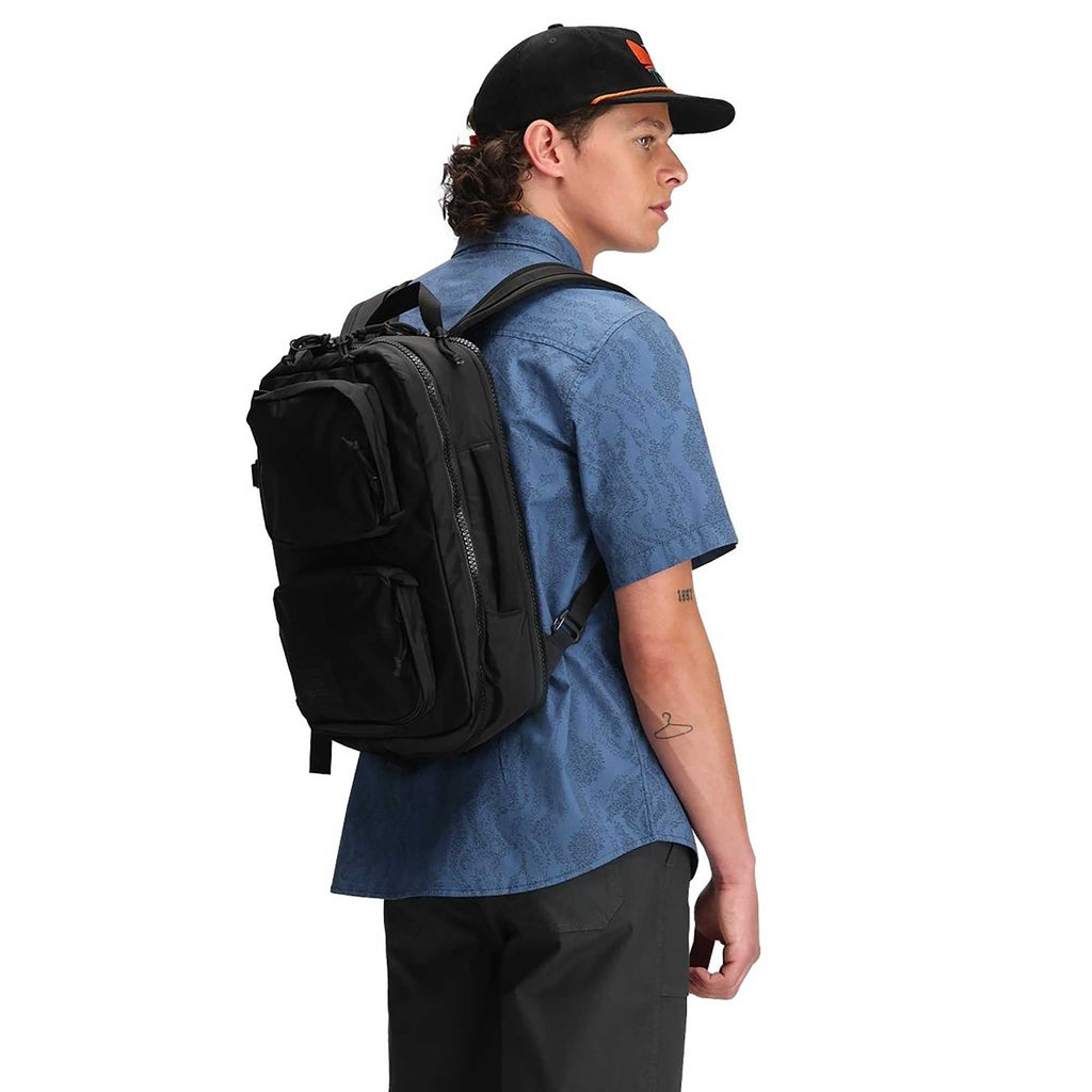 Topo Designs Global Briefcase with Backpack Straps Embroidery - Black - Left Angle On Model